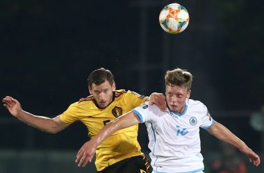 Belgium's defender Jan Vertonghen (L) and San Marino's forward Nicola Nanni go for a header during the Euro 2020 qualifier football match San Marino vs Belgium on September 6, 2019 at the Olympic stadium in Serravalle. (Photo by Isabella BONOTTO / AFP)