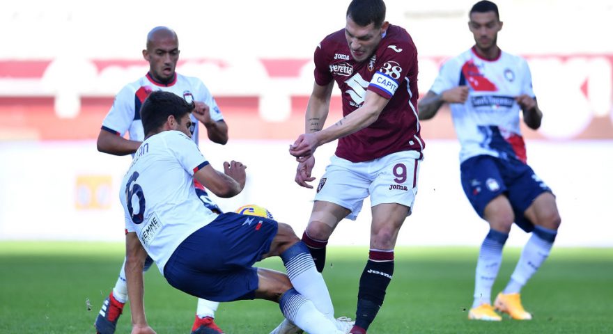 TURIN, ITALY - NOVEMBER 08:  Andrea Belotti (R) of Torino FC is tackled by Lisandro Magallan of FC Crotone during the Serie A match between Torino FC and FC Crotone at Stadio Olimpico di Torino on November 8, 2020 in Turin, Italy.  (Photo by Valerio Pennicino/Getty Images)